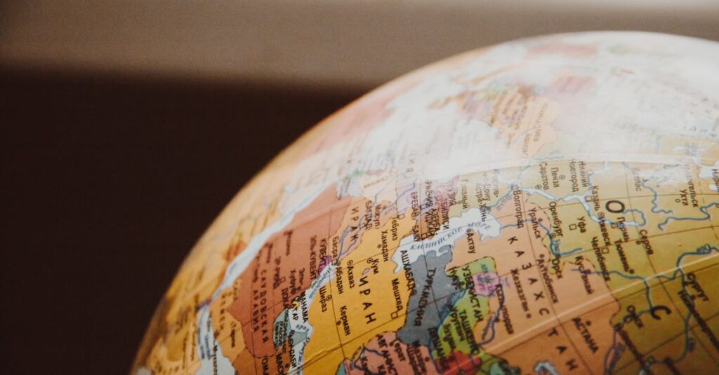 Detailed close-up of a globe showcasing parts of Europe and Asia for world exploration concepts.